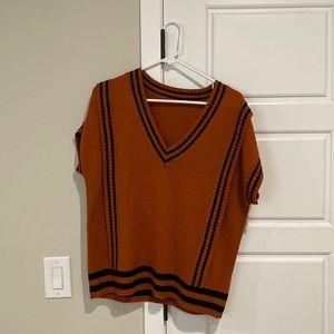 Size medium Burnt Orange sweater vest